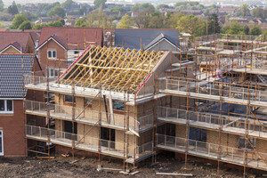 Houses in various stages of construction.